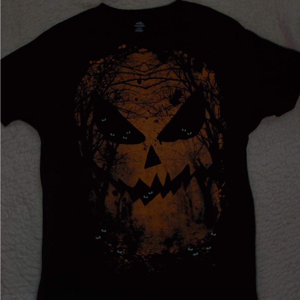 I’m selling an orange/black shirt by “way to celebrate Halloween!”. A size large